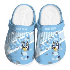 a pair of blue slippers with cartoon character on the front and bottom, for boys