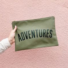 The perfect oversized clutch for all of life's adventures! Our extra large canvas pouches are ideal for holidays, adventures and everyday life! These versatile zip pouches are great for travel documents, makeup, beauty and parenting essentials. Our 'Adventures' design has been printed by hand in dark green on sturdy but soft olive green canvas. The pouches have been lovingly made in the UK, complete with a heavy-duty gold colour zip. The perfect companion to our Everything REALLY big bag! Made i Soft Olive Green, Travel Documents, Oversized Clutch, Extra Large Canvas, Large Pouch, Big Bag, Hair Accessories Gift, Travel Wallet, Gifts For Teachers