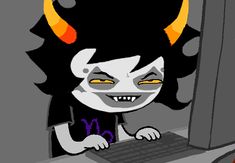 a cartoon character using a laptop computer with horns on his head and fangs on his face