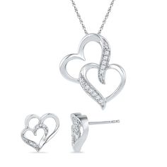 Take her breath away with this double diamond heart gift set that includes a stunning necklace pendant and matching earrings. Intertwined diamond hearts are symbolic of your love and togetherness. These double heart earrings and necklace are fashioned in sterling silver while each features one larger open heart and a smaller heart glittering with diamonds. These items can be purchased separately:Double Heart Necklace (SKU SHPH017151-SS)Double Heart Earrings (SKU SHEF073362ATW-SS) DETAILS OF THE Double Heart Necklace, Double Diamond, Earrings And Necklace, Double Heart, Heart Gifts, Open Heart, Small Heart, Stunning Necklace, Diamond Heart