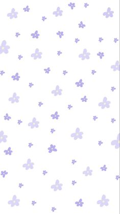 a white and purple wallpaper with small flowers on the left side of the wall