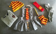 a baby's harry potter outfit and accessories are laid out on the floor next to each other