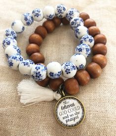 She Believed God Could Wood Bead Bracelet AND Blue Flower Stone Bracelet Stack This includes both bracelets AS PICTURED Bracelet is 6 to 6 1/2 inches-ONLY comes in one size The glass pendant design is NOT WATERPROOF, please be careful when washing your hands!! Bracelet comes in a gift pouch for safe keeping or to gift to another! Thank you! Have a blessed day! :) Bead Bracelet Stack, Flower Stone, Candy Bracelet, Wood Bead Bracelet, Bracelets Design, Beaded Bracelets Tutorial, Wood Bracelet, Beads Bracelet Design, Bracelet Diy