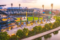 an aerial view of the pnc park stadium in pittsburgh, pennsylvania at sunset or dawn