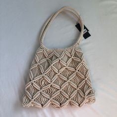 Macrame Woven Style Natural Bag Casual Macrame Bag For Spring, Summer Macrame Crochet Shopping Bag, Trendy Macrame Beach Bag, Bohemian Macrame Shoulder Bag, Spring Macrame Tote Shoulder Bag, Everyday Bohemian Macrame Shoulder Bag, Summer Macrame Beach Bag For Everyday, Casual Macrame Crochet Bag For Everyday Use, Summer Style Macrame Bags For Daily Use