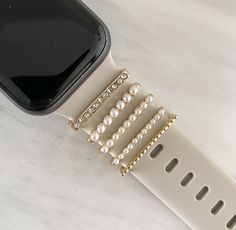 Charm For Apple Watch Charm Accessory Stackable Watch Jewellery Charm Apple Watch Band Charm Personalized Apple Watch Bracelet SHIPPING 🚚 Typical order processing and shipping is 1-2 days excluding bank holidays and yes we work weekends!  💫 Please note this item does not come with the Apple watch or Strap.  💫 Fits Apple Watch Strap 2.1cm. HOW TO ORDER  🆎 1. Pick which design you would like, style A or style B. 📸 2. Follow us on Instagram @balancedlivingtribe_ to see your order in production. CARE INSTRUCTIONS 🙌 Please handle with care and remove charm when washing your apple watch strap. PLEASE NOTE Props used in photos are NOT included with purchase the Apple Watch and Strap are for display purposes only. Colors may vary slightly on your phone and/or computer. All charms are for per Apple Watch With Gold Jewelry, Golden Apple Watch, Apple Watch With Jewelry, Classic Business Apple Watch Bracelet Strap, Luxury Gold Bracelet Strap For Apple Watch, Apple Watch Bracelets, Bracelet Apple Watch, Apple Watch Strap, Watches Jewelry