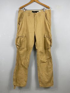 "PLEASE READ DESCRIPTION BELOW BEFORE BUYING👇🏻 *ITEM:Rocawear Cargo Pants *ITEM DETAILS: 👇🏻 Please be aware that all vintage items will usually show a few signs of wear or fading due to age, but anything visible such as stains or holes, and serious flaws have been photographed.For any further information on this item please contact us and we will be happy to help SIZE:36\" ON TAG manual size 38\" *ACTUAL SIZE MEASUREMENT: 👇🏻 WAIST: 38\"INCHES LENGTH (OUTSEAM) : 44\"INCHES (INSEAM) : 31\"IN Utility Cargo Pants With Welt Pockets For Outdoor, 80s Sportswear, Menswear Casual, Casual Outfits Fashion, Men's Bottoms, Splatter Paint, Pants Brown, Bowling Shirts, Trouser Style