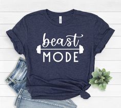 Beast Mode Gym Shirt, Runner Gym T-Shirt, Fitness exercise Shirt, Workout shirt, Body Build Tee, Gym Shirt, Exercise Shirt  HOW TO ORDER  1-Choose your t-shirt size. 2-Choose your t-shirt color. 3-Type your design color (BLACK or WHITE) 4-Select the quantity, 5- Click Add To Cart. For multiple items go back to the listing and repeat the steps.  CARE INSTRUCTIONS  Wash item inside out in cold water Do not bleach Do not dry clean Do not iron directly on the design. *Please aware that Unisex t-shir Comfortable Pre-shrunk Workout T-shirt, Blue Workout T-shirt With Letter Print, Blue Letter Print T-shirt For Workout, Blue T-shirt With Letter Print For Workout, Graphic Tee Shirt For Workout With Relaxed Fit, Pre-shrunk Casual Gym Shirt, Pre-shrunk Relaxed Fit Workout Shirt, Pre-shrunk Relaxed Fit Shirt For Workout, Relaxed Fit Graphic Tee For Workout