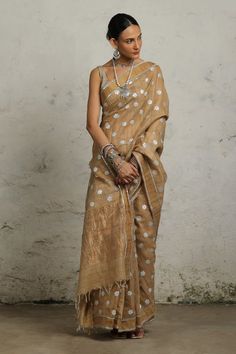 Beige tussar silk saree with metallic silver bootis and golden zari applique hand embroidery. Comes with an unstitched blouse piece. - Aza Fashions Embroidered Saree, Tussar Silk Saree, Hand Applique, Sarees Online, Blouse Piece, Aza Fashion, Silk Saree, Silk Sarees, Hand Embroidered