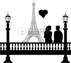 a couple is sitting on a bridge near the eiffel tower in paris, france