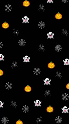 halloween wallpaper with pumpkins and ghost faces