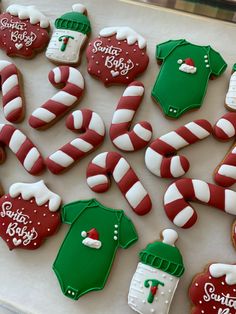 decorated cookies are arranged on a table