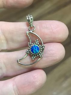 "Blue Moon Opal Pendant This opal is lab grown. 925 sterling silver chain. 18-20\". 925 Sterling Silver" Art Nouveau Pendant, Jasper Ring, 925 Sterling Silver Chain, Opal Pendants, Blue Moon, Sterling Silver Chains, Blue Topaz, Pendant Necklaces, Lab Grown