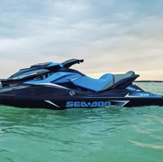 a blue and black jet ski in the water