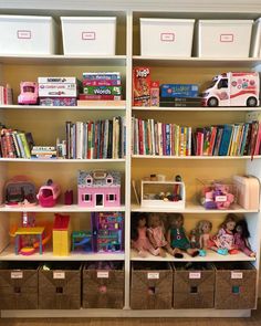 two children's bookshelves filled with toys and storage bins on top of them