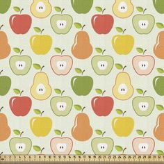 an apple and pear pattern on white fabric