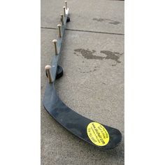 an upside down skateboard laying on the ground