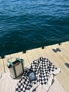 ll bean boat and tote on a lake dock with a checkered beach towel and kindle Lake Boating Aesthetic, Lake Weekend Aesthetic, Lake Dock Aesthetic, Boat And Tote Ll Bean, Lake Aesthetics Summer, Dock Aesthetic, Summer Vacation Photo Ideas, Instagram Rebrand, Lake Day Aesthetic