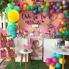 a birthday party with balloons and decorations