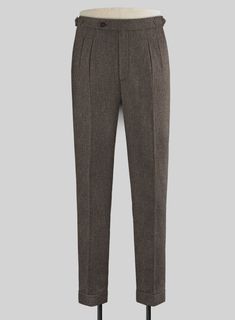 Incorporate refined, elegant style into your formal rotation with our Carre Brown Highland Tweed Trousers. Crafted from wool, its deep tone has the right amount of poise to make a strong statement wherever you go. 
 
Look Includes   Carre Brown Tweed Fabric  Cross Pocket  Forward 2 Pleats  Side Tabs (No Loops)- Arrow Shape  Bottom Cuff (1.5")  Two Welted Back Pockets on Trousers   Click 'Customize Now' to modify the look if needed. 
 
Lining: Viscose, Dry Clean. Loose Tweed Pants, Grey Tweed Suit, Herringbone Tweed Jacket, White Linen Suit, Green Velvet Jacket, Peaky Blinders Suit, Royal Blue Suit, Fabric Cross, Tweed Trousers