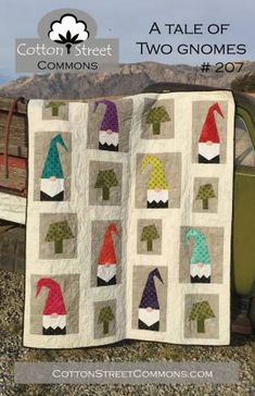 a quilt made to look like gnomes on the side of a truck with text overlay