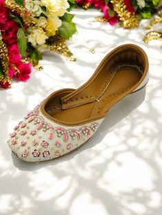 Discover our handcrafted ivory wedding khussa where tradition meets artistry. Each pair is made with care, ensuring unique and meticulously designed details. Whether for weddings, as diwali shoes, or everyday wear, these khussas offer heritage craftsmanship and modern comfort. Designed for elegance and comfort, these juttis are a must-have!