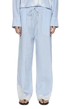 Airy embroidered-mesh insets add a pretty touch to these drawstring pants cut from lightweight cotton patterned with pencil stripes. Drawstring waist Side-seam pockets 100% cotton Machine wash, line dry Imported Luxury Cotton Bottoms With Vertical Stripes, Blue Cotton Pants With Side Stripes, Cotton Striped Beach Pants, Multicolor Cotton Sleepwear Pants, Non-stretch Striped Pants With Pockets, Cotton Pants, Drawstring Pants, Drawstring Waist, Bottoms Pants