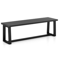 a black bench sitting on top of a white floor