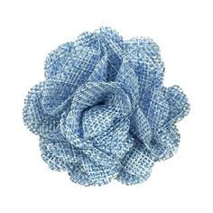 a blue and white fabric flower on a white background with clipping to the center