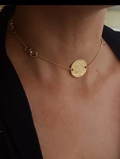 "A beautiful choker necklace designed in a boho chic style perfect for every day and evening. the necklace made from gold 24 K plated brass in very high quality and decorated with an Infiniti pendant in the side and coin in its center. chain size : 11.8\" (30cm) up to 17.7\" (45cm). pendant width: 0.98\" (2.5cm) Pendant height: 0.98\" (2.5cm) ♦ This piece of jewelry is perfect as a gift for yourself, for a friend, Valentine's day or a birthday. If you're interested in sending a gift to a third p Bohemian Clavicle Chain Choker Necklace, Elegant Festival Choker With Clavicle Chain, Elegant Clavicle Chain Choker For Festivals, Gold Bohemian Clavicle Chain Necklace, Bohemian Gold Clavicle Chain Necklace, Bohemian Clavicle Chain Choker, Adjustable Bohemian Choker Chain Necklace, Elegant Coin Pendant Choker Necklace, Delicate Chain Necklace For Festivals