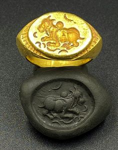 Ancient Gold Ring Probably From Ancient Pyu City States Period Burma South East Asia. Ring With Typical Nandi bull symbol on it. The Rings is made of 17 karat Gold. Total Weight Is Almost 19.56 Grams. We Can Provide Gold Certificate As Well On Request. Traditional Handmade Gold Signet Ring, Traditional Yellow Gold Signet Ring For Ceremonial Use, Traditional Yellow Gold Signet Ring For Ceremonial Occasion, Traditional Yellow Gold Ceremonial Signet Ring, Traditional Gold Engraved Ring With Polished Finish, Traditional Engraved Yellow Gold Signet Ring, Traditional Carved Yellow Gold Rings, Ancient Style Gold Rings For Gifts, Gold Ancient Style Signet Ring For Ceremonial Use