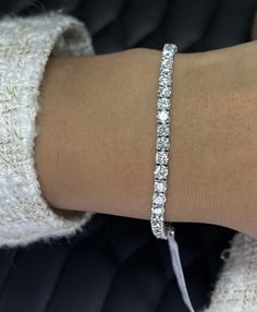 Indulge in luxury with this stunning 9.66 Ct F/VS-SI Top Quality Natural Round Diamond Tennis Bracelet in 18k White Gold. This handmade piece features a beautiful white/colourless diamond with excellent cut grade and very good cut, making it a perfect accessory for any occasion. The prong setting style and authentication certificate ensure the diamond's security and authenticity. Measuring 7 inches in length, this bracelet is perfect for nature-themed events or as a Valentine's Day, Christmas, w Luxury Platinum Tennis Bracelet Gift, Luxury Platinum Tennis Bracelet For Gift, Luxury Platinum Tennis Bracelet As Gift, Luxury Tennis Bracelet With 17 Jewels, Aaa Quality Diamond Bracelet For Formal Occasions, Luxury Aaa Quality Tennis Bracelet For Formal Occasions, Luxury White Gold Round Cut Tennis Bracelet, Elegant Aaa Quality Tennis Bracelet For Anniversary, Luxury White Tennis Bracelet