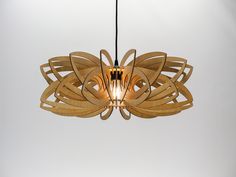 a wooden chandelier hanging from a ceiling