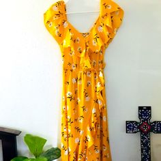 This Very Light Summer Dress Is Beautiful,Comfy And Flowery. Never Wore With Tag Yellow Maxi Sundress With Ruffles, Yellow Ruffled Maxi Sundress, Yellow Floral Sundress For The Beach, Yellow Floral Sundress For Beach, Yellow Floral Dress With Ruffles For Garden Party, Yellow Floral Sundress For Spring, Yellow Floral Sundress For Garden Party, Yellow V-neck Floral Dress For Garden Party, Casual Yellow Floral Dress For Brunch