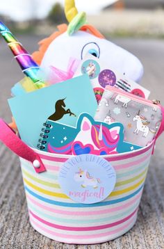 a colorful basket filled with lots of different items on top of a carpeted floor