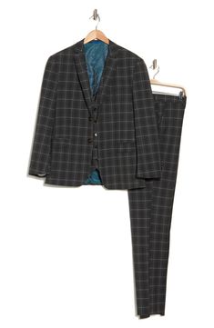 Impeccably tailored in windowpane-patterned fabric, this three-piece suit features a softer shoulder for a more natural profile. Jacket has notched lapels; four-button cuffs; chest pocket; flap pockets; interior pockets Vest has front welt pockets; adjustable back half belt Trousers have zip fly with hook-and-bar closure; slant pockets; back button-welt pockets Unhemmed Jacket is lined; trousers are lined to the knee 63% Terylene polyester, 35% rayon, 2% spandex Dry clean Imported Pocket Vest, Three Piece Suit, Nordstrom Store, Patterned Fabric, Three Piece, Welt Pockets, Flap Pocket, Welt Pocket, Chest Pocket