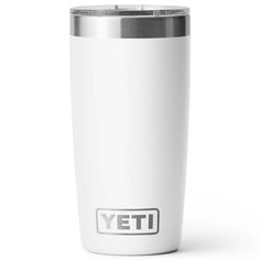 a white yeti cup with the word yeti on it's front and side