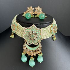 Mint Antique Polki Kundan necklace, Statement necklace, Indian Jewelry, Pakistani Jewelry,Wedding necklace, Bridal necklace Antique Polki Kundan necklace set/Statement necklace Set/Indian Jewelry/Pakistani Jewelry set/Wedding necklace/Bridal necklace/Indian This is 100% Handmade jewelry. So Color, shades, texture displayed may slightly vary from the actual product due to digital image limitations. We request you to consider these minor variations. Please expect the possibility of some slight imp Green Necklace With Intricate Design For Wedding, Round Beaded Necklaces For Weddings And Festivals, Beaded Choker Jewelry Sets For Wedding, Beaded Choker For Wedding And Diwali, Green Wedding Choker Jewelry, Green Kundan Beaded Necklaces For Weddings, Green Kundan Choker Necklace For Wedding, Green Kundan Beaded Necklace For Wedding, Green Kundan Pearl Necklace For Wedding