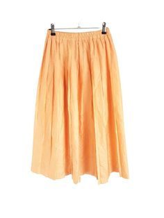 🍊 French vintage apricot orange pleated midi skirt  * Size:  No size label but would fit a UK 6/8 (EUR 34/36)  * Brand:  None * Made in:  Made in France  * Material:  100% polyester  * Measurements (Inches):  Waist - 23" - 35" max stretch (elasticated around waistband) Hips - Free Length from top of waistband to hem of skirt  - 30"  * Condition: Excellent vintage condition! Orange Pleated Skirt, Apricot Orange, Full Midi Skirt, Skirt Vintage, Size Label, Pleated Midi Skirt, Vintage Skirt, French Vintage, Pleated Skirt