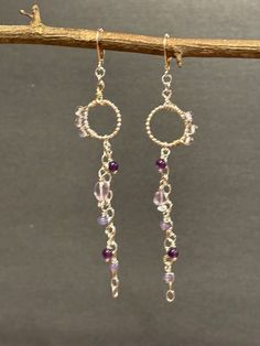 These are a one of a kind beautiful handmade sterling silver, Pink and Purple amethyst Beaded Cascading Wire Wrapped Beaded Hoop Semi Precious Gemstone Earrings. Closing with sterling silver leverbacks. Measuring at a length of 3 3/4 inches Purple Sterling Silver Beaded Dangle Earrings, Fusion Style Sterling Silver Dangle Chandelier Earrings, Sterling Silver Fusion Chandelier Dangle Earrings, Sterling Silver Beaded Earrings With Dangling Beads, Sterling Silver Wire Wrapped Dangle Beaded Earrings, Sterling Silver Dangle Earrings With Wire Wrapped Beads, Handmade Purple Sterling Silver Chandelier Earrings, Nickel-free Purple Sterling Silver Beaded Earrings, Diy Earring