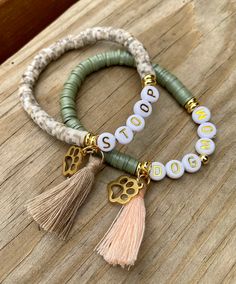 This bracelet is perfect for animal lovers & fur mamas! It is customized to read your pet's name, or I can also write dog mom/fur mom! It comes with a cute little paw print and tassel. It can be made without a tassel as well.  ⭐️The gold discs are 14k non-tarnish beads.  ⭐️I can make bracelets in any size! To find your perfect fit, see the measuring directions in the item pictures. ⭐️The heishi bead color can be changed. I can do the speckled brown as shown, or I have: 🐾plain brown/speckles brown 🐾speckled gray 🐾sage green 🐾light pink 🐾black with white speckles/plain black 🐾white/white with black speckles 🐾sky blue/royal blue 🐾mauve 🐾mint with black speckles 🐾olive green 🐾if you do not see a color you like, please message me. I have so many colors!  ⭐️Tassel Colors: 🐾brown (in Paw Print Bracelet, Heishi Bracelet, Mom Bracelet, Fur Mom, Moms Bracelet, Pet Name, Colors Brown, Name Bracelet, Heishi Beads