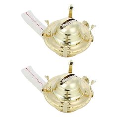 two brass teapots with white handles