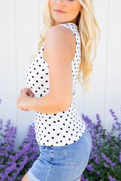 Be all dotted up in this fun and flirty tank! Perfect for summer, this ivory and black scoop neck polka dot top will give you a cute, stylish look and will have you ready to take-on the sunshine! Model Specs: 5'5", 34DD, Size 3, Wearing size Small Fabric: 97% Polyester, 3% Spandex Sizing Recommendations: Small 0/4 Medium 6/8 Large 10/12 Black Dots, The Sunshine, Polka Dot Top, Polka Dot, Scoop Neck, Dots, Spandex, Fabric, How To Wear