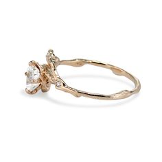 If you're looking for a unique engagement ring that is as natural and organic as it is elegant, then look no further. The twig band of this Naples morganite half halo engagement ring is cast in solid gold or platinum, and features an ethereal peachy pink morganite surrounded on one side by four tiny diamonds. Pairs with any of the Naples Contour wedding rings . View Video of this Ring Naples Collection A Naples ring makes you feel like you're walking through a forest of winterberries! The band i Contour Ring, Contour Wedding Band, Forever One Moissanite, Pink Morganite, Natural Diamond Engagement Ring, Tiny Diamond, View Video, Lovely Ring, Halo Ring