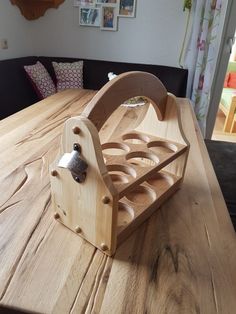 a wooden cutting board on top of a table