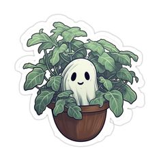 a potted plant with a ghost face in it