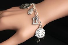 Gemini Bracelet.  Gemini Charm Bracelet. Zodiac Bracelet. Sun Sign Bracelet. Horoscope Bracelet with Silver Charms. Handmade Jewelry. by GatheringCharms from Gathering Charms by Gilliauna. Find it now at https://ift.tt/1SCWovS! Adjustable Silver Celestial Charm Bracelet, Silver Zodiac Sign Jewelry, Celestial Silver Metal Bracelets, Celestial Style Silver Metal Bracelets, Silver Zodiac Sign Symbolic Bracelets, Silver Zodiac Sign Bracelet, Silver Zodiac Sign Symbolic Bracelet, Symbolic Silver Charm Bracelet For Friendship, Gemini Bracelet