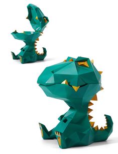 an origami model of a green alligator