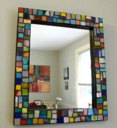 a mirror that is sitting on the wall