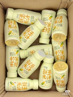 a box filled with lots of different types of baby bottles in it's packaging